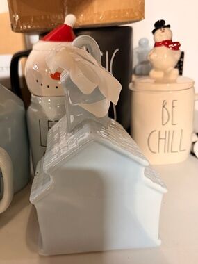 Rae Dunn light blue ceramic holiday house with ribbon